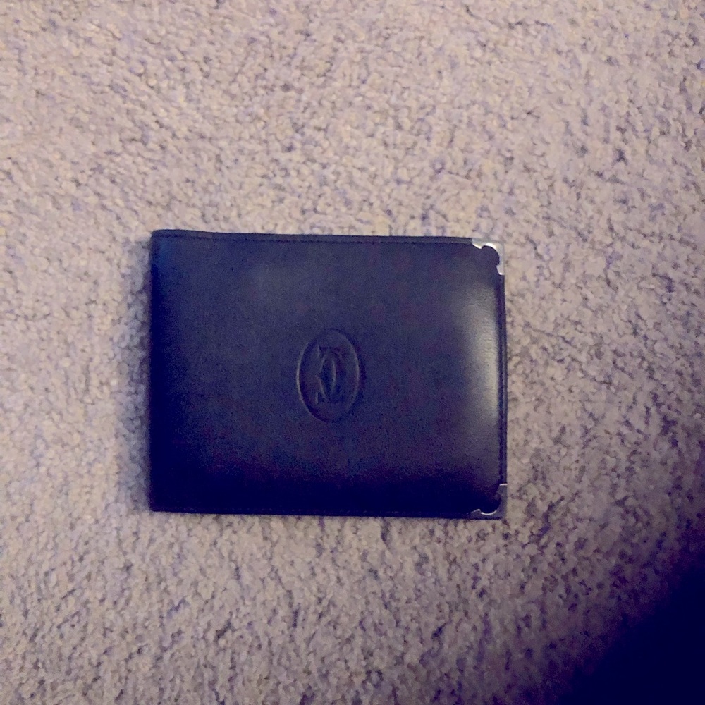 Cartier wallet- there is a crease on the backside of wallet,new pic/my bad